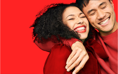 Woman and child laughing in a slide