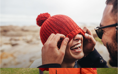 Two women with backpack walking in the countryside